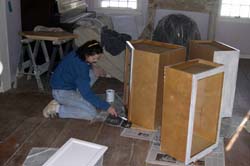 Jeanne painting cabinets